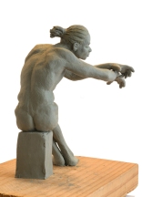 Seated Man Clay Sculpture